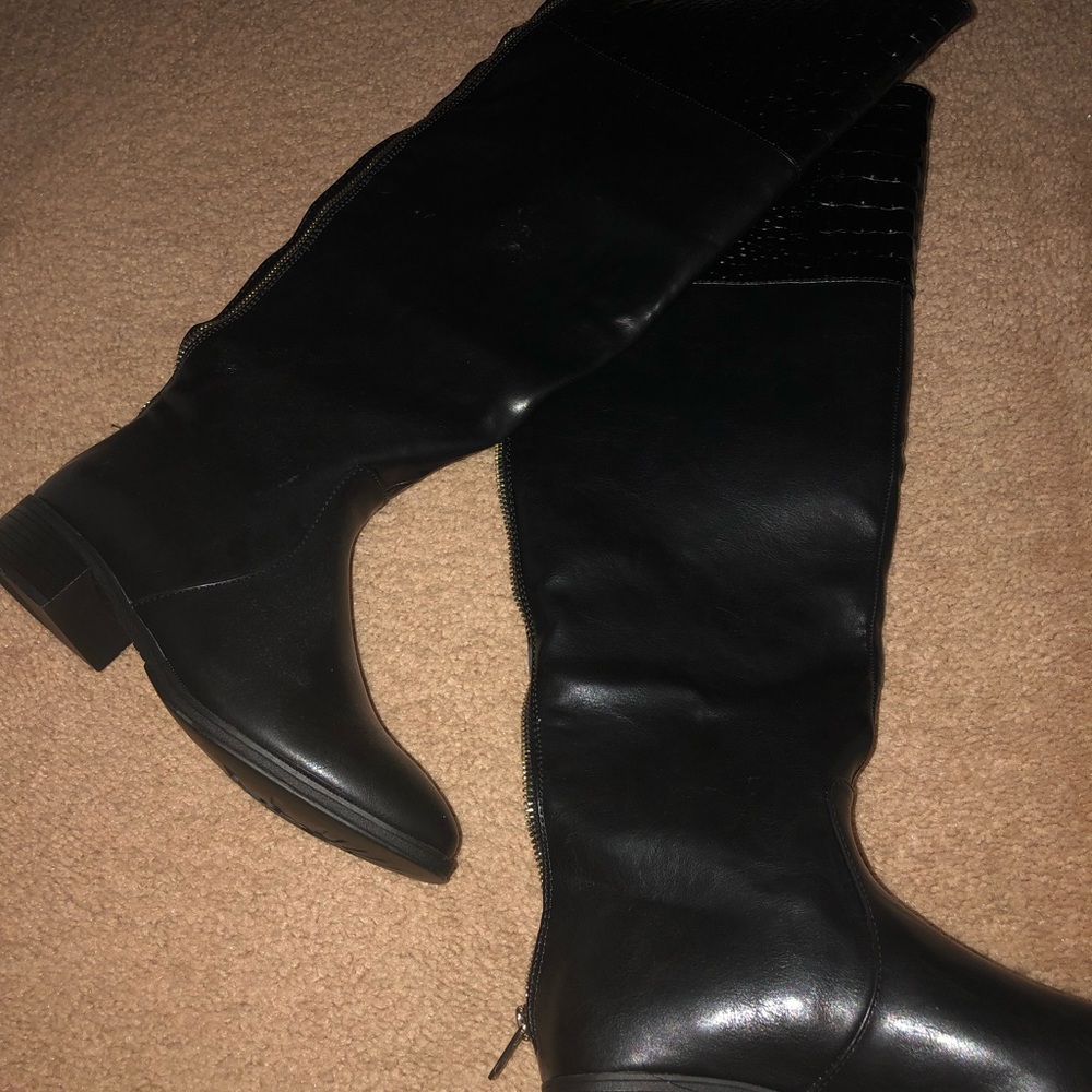 Knee high boots. Never worn. Black
